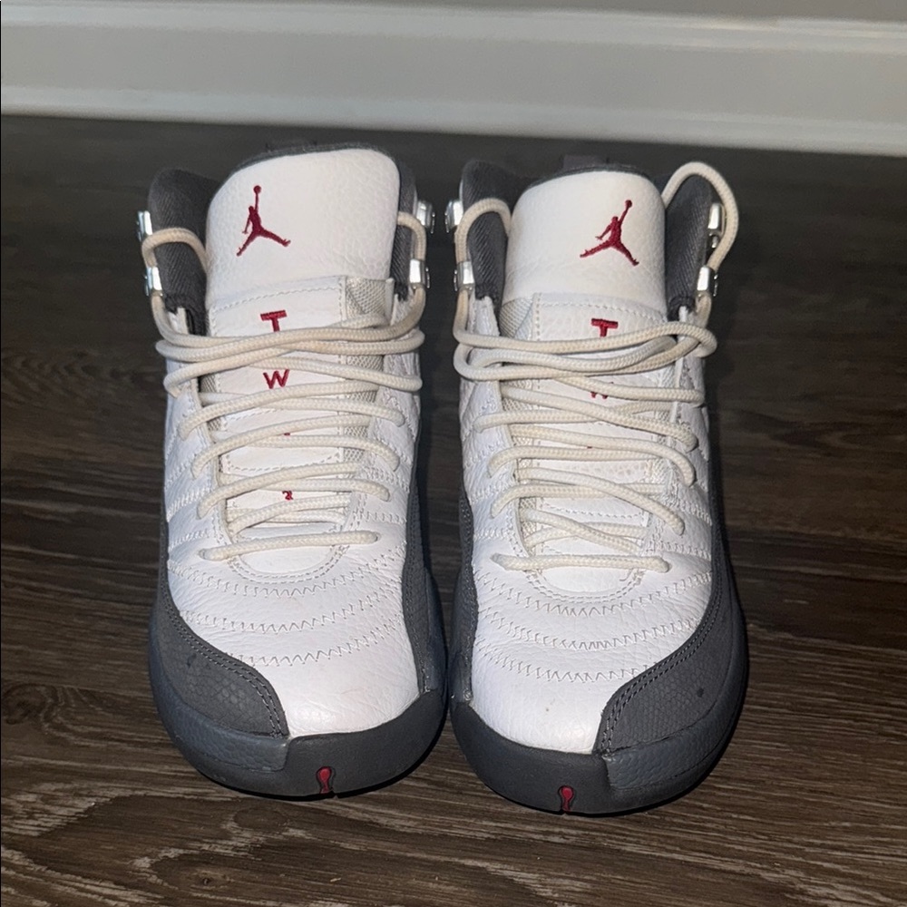White and Gray Sneakers with Red Accents